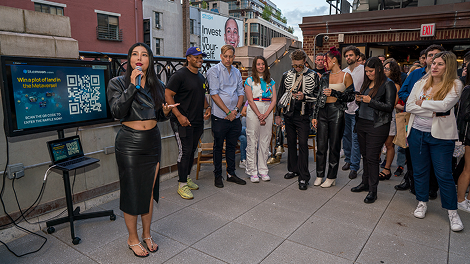 Host speaking to guests at a Creator Nations evening.